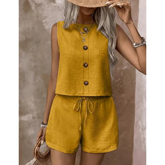 Women's sleeveless button-down blouse and shorts