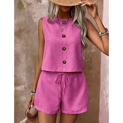 Women's sleeveless button-down blouse and shorts