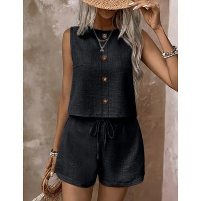 Women's sleeveless button-down blouse and shorts