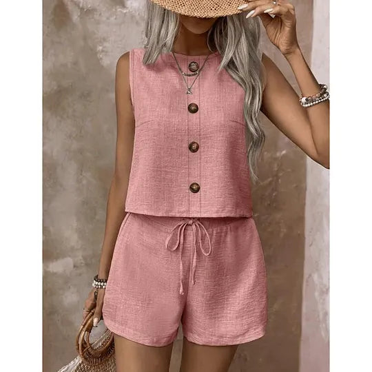 Women's sleeveless button-down blouse and shorts